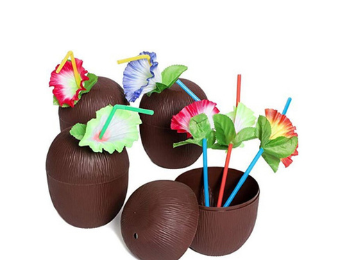 Coconut glass with straw and flower
